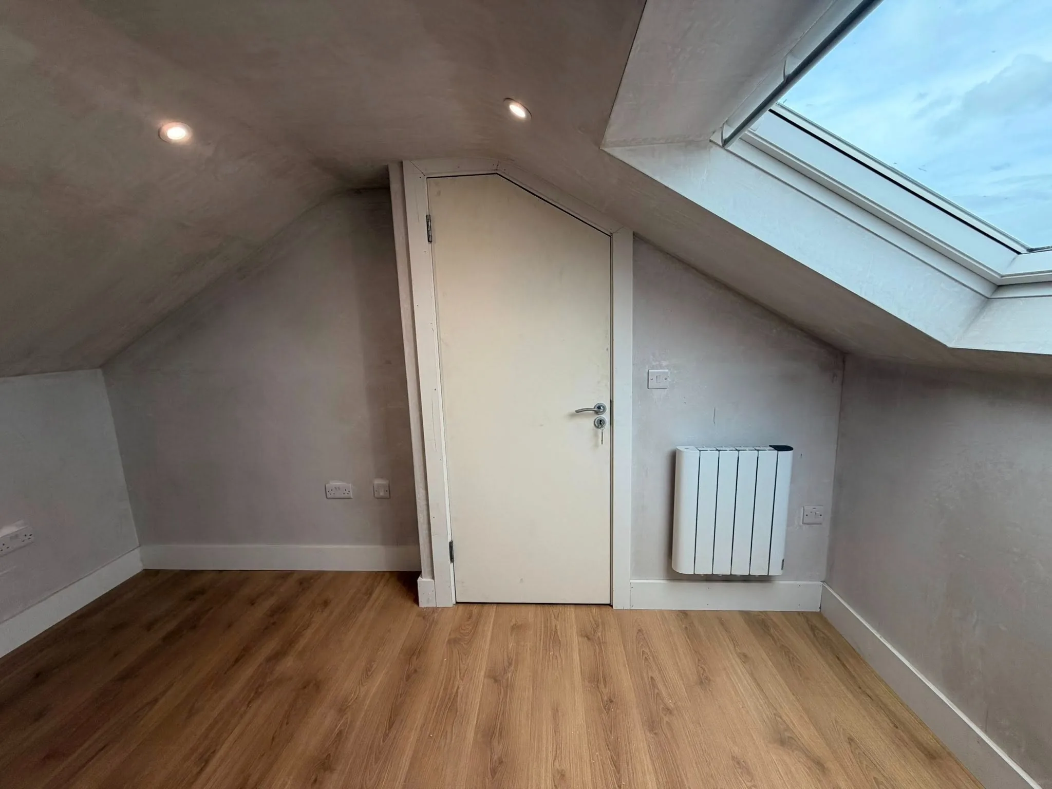 Warm oak-floor attic fit-out - Attic conversion in Waterford
