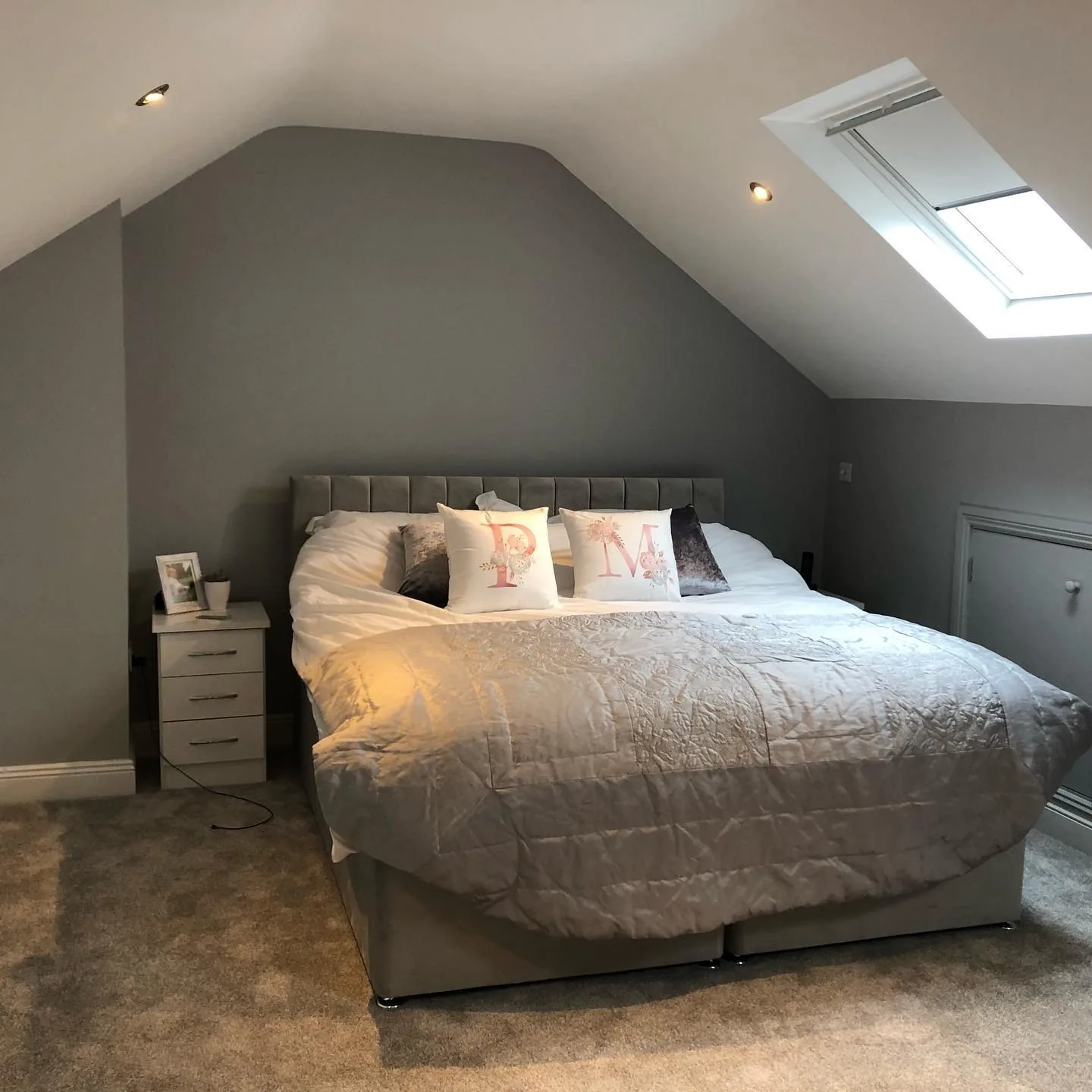 Foxwood Waterford attic master bedroom, furnished in grey palette